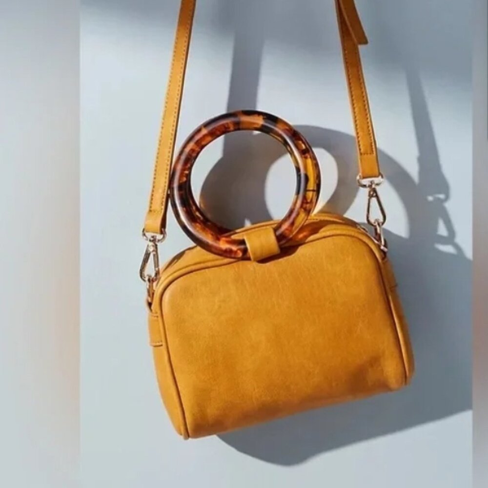 Anthropology tan camera bag purse with Lucite handles